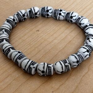 Halloween stretch bracelet/ black & white skeletons/ fits size 6 3/4 in wrist